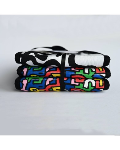 ETTA LOVES x Keith Haring - Frise d'éveil réversible en coton bio